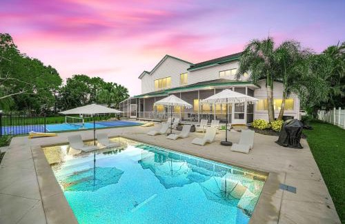Sebring House | 6BR Lakefront Home w Pool Pickleball More