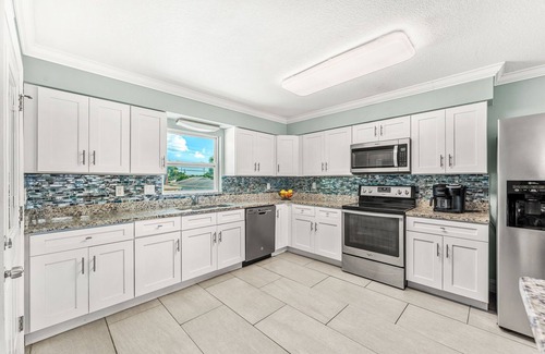 Port Canaveral House | 7 bd 7 bth Slps 30! 3 kitchens! Pool, Sauna, Beach, Hot tubs, Game Rm, Golf Cart