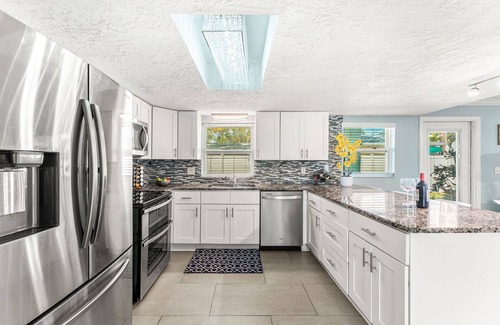 Port Canaveral House | 7 bd 7 bth Slps 30! 3 kitchens! Pool, Sauna, Beach, Hot tubs, Game Rm, Golf Cart