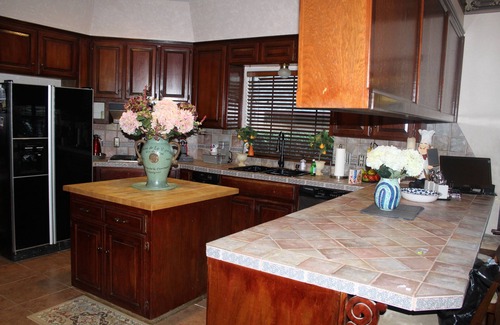 Norman House | 7 bedroom , 5.5 bathroom, sleep 16+, Pool, Theater room, Hot Tub, Game room.