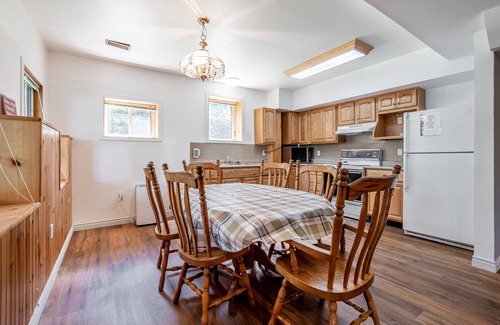 Minden Hills Cottage | 7 bedrooms, 2 kitchens, large deck overlooking lakefront cottage. Max 14 persons