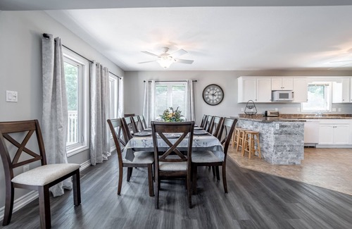 Minden Hills Cottage | 7 bedrooms, 2 kitchens, large deck overlooking lakefront cottage. Max 14 persons