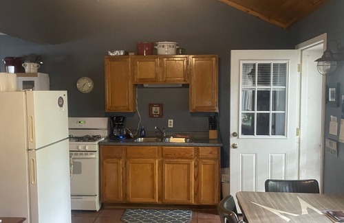 Ludington Cottage | #8 cottage comes with boat docks and shares over 600’ of frontage on Hamlin lake