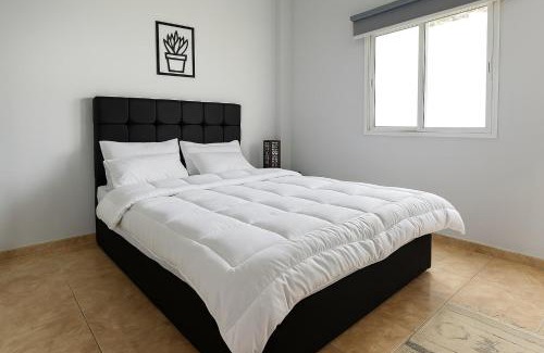 Sheikh Zayed City Apartment | 819. 2BR Townhouse Sofa Bed TVs 2 Baths Garden