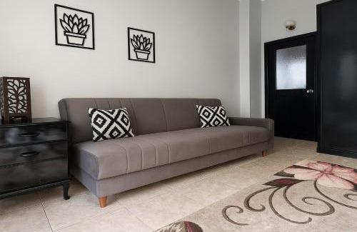 Sheikh Zayed City Apartment | 819. 2BR Townhouse Sofa Bed TVs 2 Baths Garden