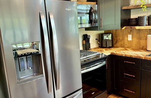 La Follette Cabin | 9 bdrm covered dock, firepit and large bar on water, Baltic hot tub, sleeps 26,