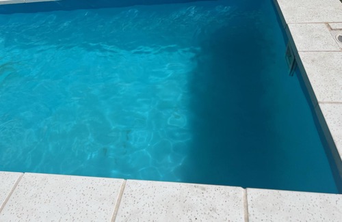 Cordoba House | A bedroom and a bathroom