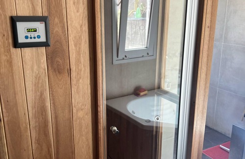 Cordoba House | A bedroom and a bathroom