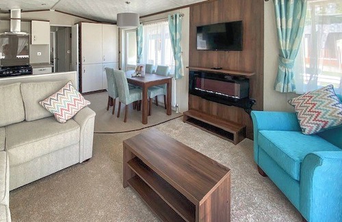 Langham House | A cosy holiday home with one master double and two twin rooms.