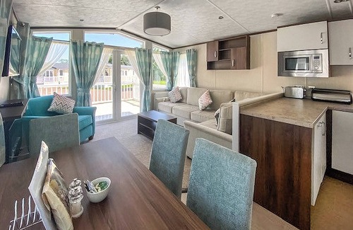 Langham House | A cosy holiday home with one master double and two twin rooms.