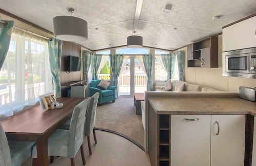 Langham House | A cosy holiday home with one master double and two twin rooms.