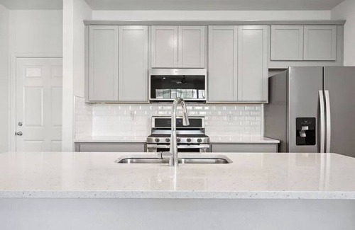 Aurora House | A cozy home near miles of trails, playgrounds, and 22 Acre Central Park.