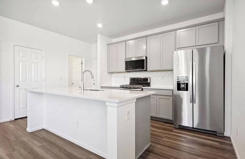 Aurora House | A cozy home near miles of trails, playgrounds, and 22 Acre Central Park.
