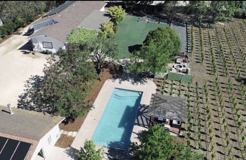 Sonoma House | A gated vineyard oasis with main house, pool house, hot tub, bocce & more