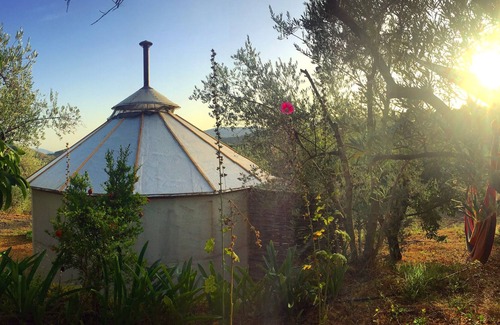 Lanjaron Cabin | A majestic Almond Yurt located in the Sierra Nevada mountains.