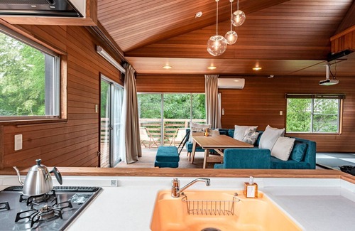 Yawatano House | A rental villa with a large garden that doubles as a dog run surrounded by trees/Ito Shizuoka