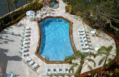 Ludlam Hotel | A short drive away from Phillips Park! 2 Contemporary Units! Pool, Pets Allowed!