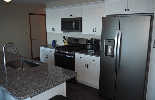 Elk Rapids Cottage | A Short's Walk - Sandy Lakefront with Spa/Hot Tub and Kayaks!