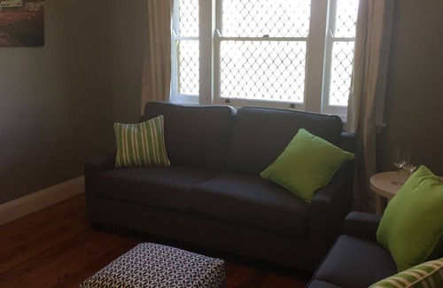 Orange Apartment | A stroll away from town centre