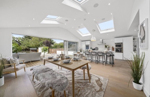 Windsor House | A stunning five-bedroom home located in the heart of Windsor driveway parking!