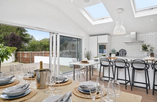 Windsor House | A stunning five-bedroom home located in the heart of Windsor driveway parking!