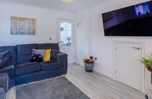 Woodhall Spa Cottage | A superb modern house with a hot tub set under a gazebo with twinkling fairly lights.