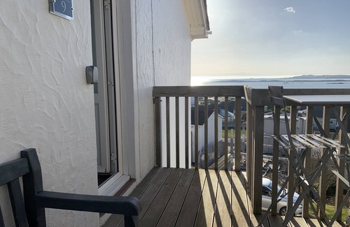 Rhosneigr Apartment | A top floor seaside apartment sleeping 5 in 2 bedrooms with panoramic sea views.