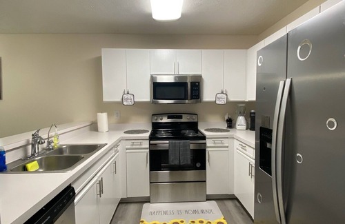 Terry Sanford Condo | A Touch of Sunshine Ideal For Long Term Stays