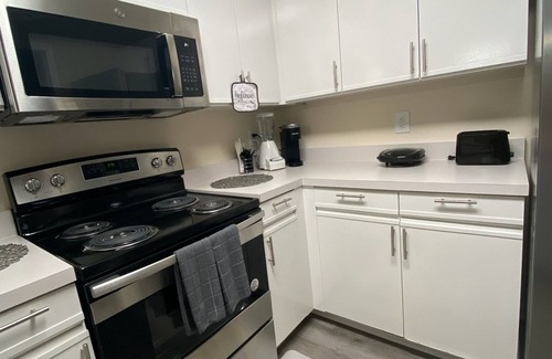 Terry Sanford Condo | A Touch of Sunshine Ideal For Long Term Stays