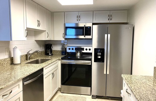 Daytona Beach Shores Condo | A WAVE FROM IT ALL - Magical Ocean Views Peck Plaza Condo Heated Pool, Hot Tub