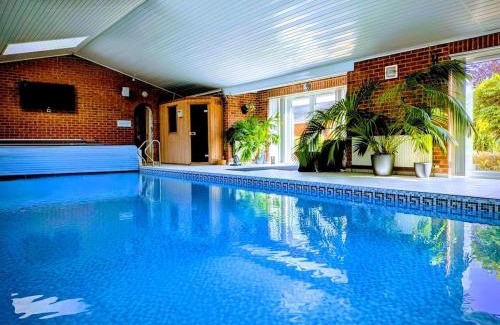 Goxhill Villa | Aberfall Villa Pool Hot Tub Saunas Gym Cinema Gdns