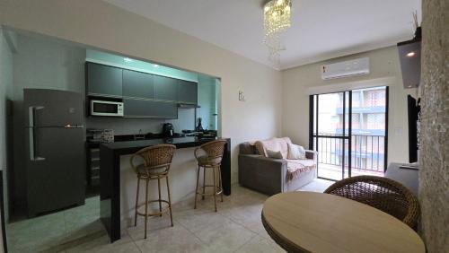 Enseada Apartment | Aconchego e conforto na praia