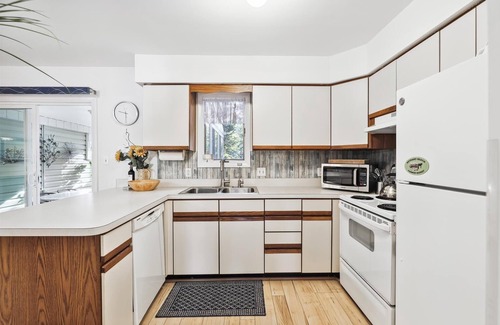 Bethany Beach House | Activities included up to $300 FREE PER WEEK! Perfect family vacation getaway only a short stroll from the surf and sand! Recharge with friends and family alongside the salt water swimming pool!