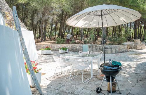 Ostuni Hotel | Ad un passo da Cisternino - Trulli con Foresta, Bici e BBQ