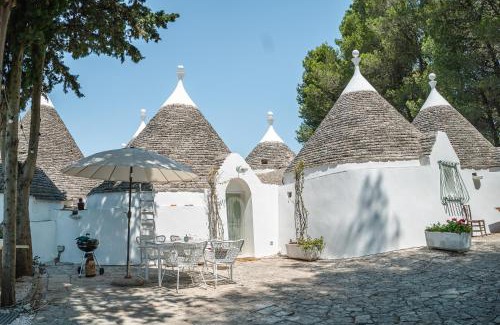 Ostuni Hotel | Ad un passo da Cisternino - Trulli con Foresta, Bici e BBQ