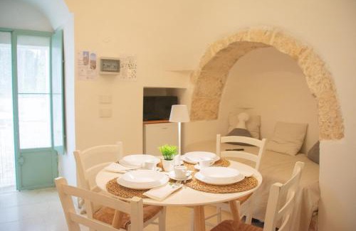 Ostuni Hotel | Ad un passo da Cisternino - Trulli con Foresta, Bici e BBQ