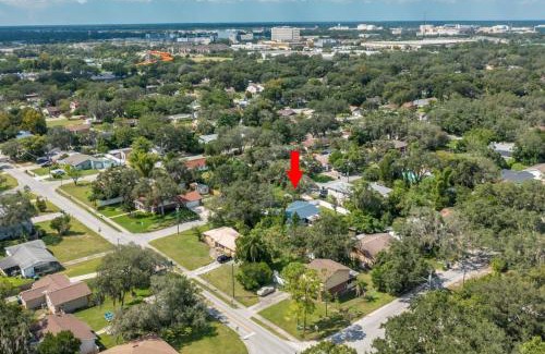 Terrace Park House | Adventure Awaits in Tampa Bay with Beautiful Decor 4BR with Backyard Oasis Near Busch Gardens & Adventure Island