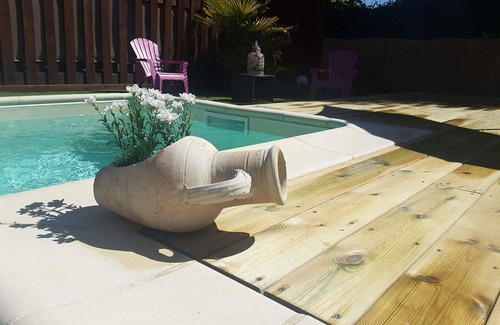 Biscarrosse Villa | Air-conditioned wooden house, heated swimming pool, spa, internet and bicycles in a quiet location