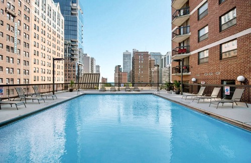 Rush and Division Apartment | Airy Gold Coast 2BR w/Gym, Pool, near. Oak St. Beach, by Blueground