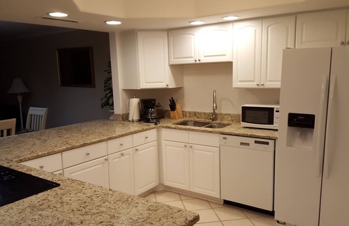 Holiday Isle Condo | Amazing Beachfront Destin Condo with Umbrella & 2 Chairs Setup Included