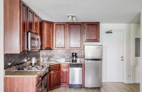 Gold Coast Apartment | Amazing Gold Coast 1BR w/Doorman & Gym, 2 blocks to L, by Blueground
