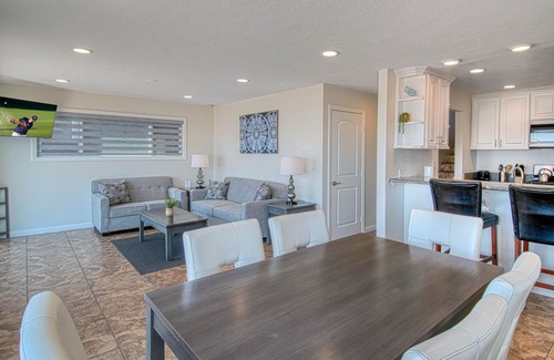 West Newport Condo | Amazing location with an amazing, newly-remodeled lower unit right on the sand!