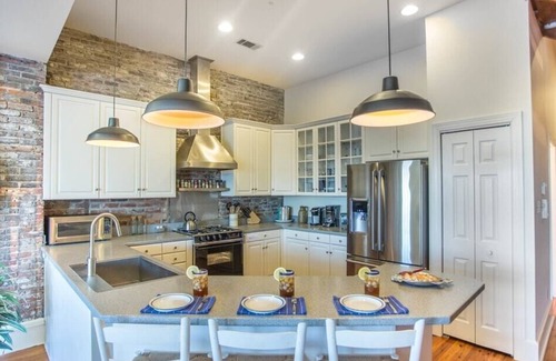 Historic District - North Condo | Amazing Loft with Parking and Deck above River Street by Lucky Savannah