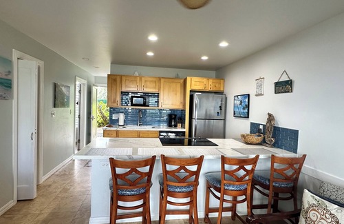 Wailua Condo | Amazing views from this ground floor, corner unit steps from the beach!