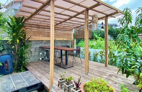 Yakena House | An inn where you can experience a traditional Okinawan wooden minka. Enjoy the comfort and healing space! （The owner will welcome guests at the parking lot upon check-in.