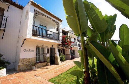 Nerja House | Andalusian people. Maria House