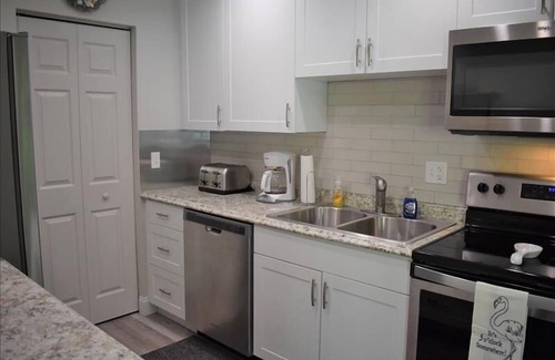 Whitney Beach Condo | Anna Maria and Beaches minutes away~Pool, boat dock