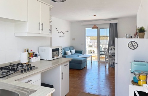 Arenal d'en Castell Apartment | Apartamento con Piscina y Solarium