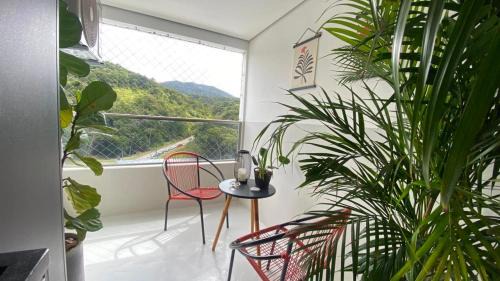Itajai Apartment | Apartamento moderno no MaxHaus Praia Brava Piscinas, Academia e Vista Verde