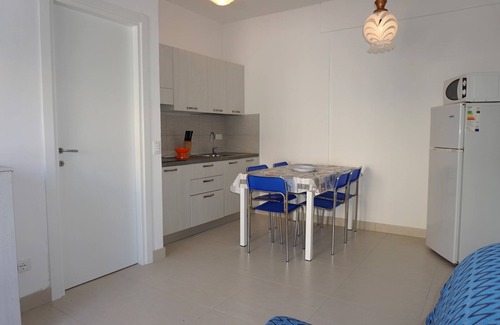 Porto Santa Margherita Apartment | Apartment with private garden